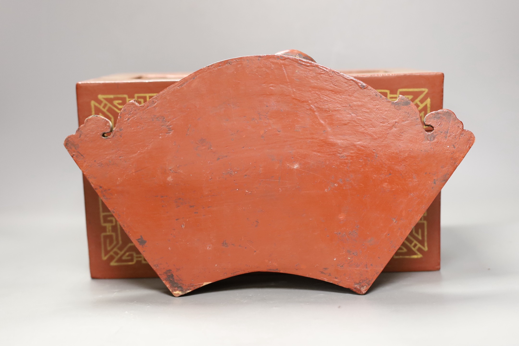 A Chinese lacquered wood Budai carving, 34cm wide, and a Chinese lacquered wood box (2)